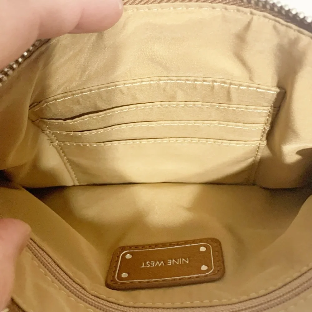 Nine West Faux Leather Wristlet Fully Line in Tan Print Studded Logo Plate Brown